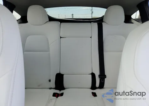 2025 Tesla Model Y из США, поврежденный, VIN 7SAYGAEE7SF305480